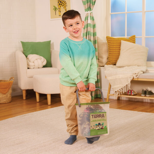 Boy with bucket of critters