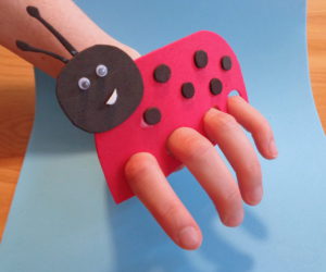 felt ladybird finger puppet.